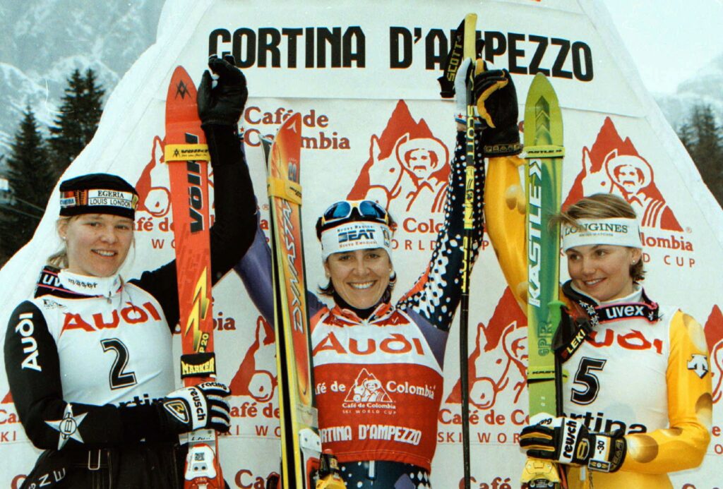 Seizinger, Compagnoni e Nel sul podio del gigante di Cortina d'Ampezzo in Coppa del Mondo, gennaio 1997 ©Pentaphoto